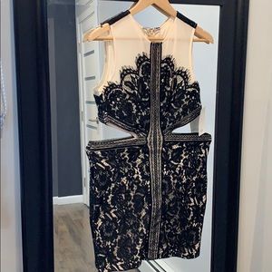 Black lace dress with sheer see-though sections